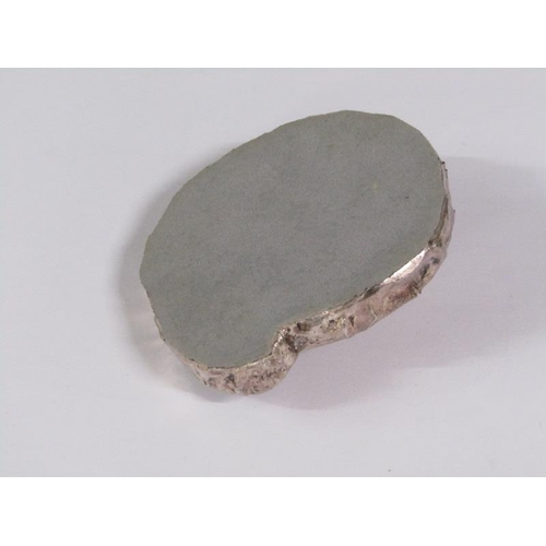 65 - A silver frog on a fossilised stone base, silver mounted with date letters (rubbed), 8cm w.