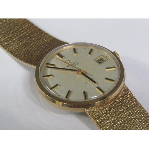 100 - An Omega automatic De Ville 9ct gold gentleman's wristwatch movement and strap, 66g overall.