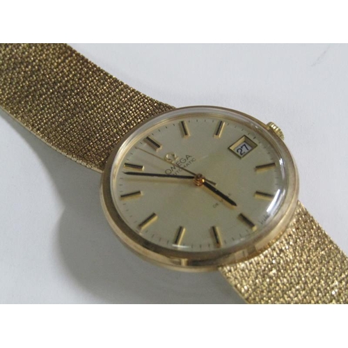 100 - An Omega automatic De Ville 9ct gold gentleman's wristwatch movement and strap, 66g overall.