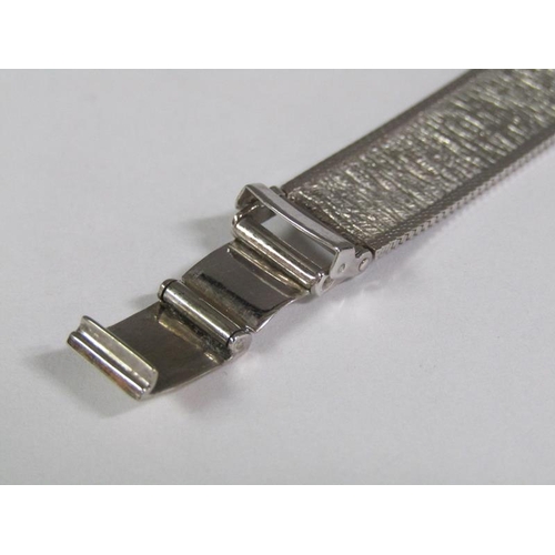 102 - A Tissot 9ct white gold ladies wristwatch, c.1975, movement no.1989755, 21.5g overall.