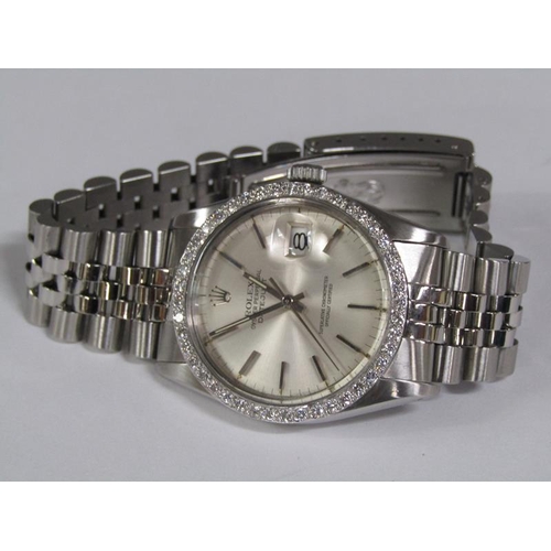 103 - A Gent's Rolex Oyster Perpetual Datejust wristwatch with diamond bezel on a stainless steel strap, s... 