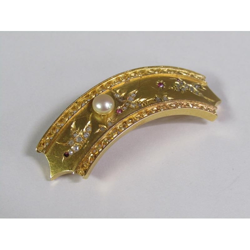 132 - An 18ct gold curved brooch incised with three birds decorated with diamond and ruby and mounted by a... 