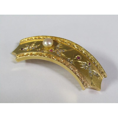 132 - An 18ct gold curved brooch incised with three birds decorated with diamond and ruby and mounted by a... 