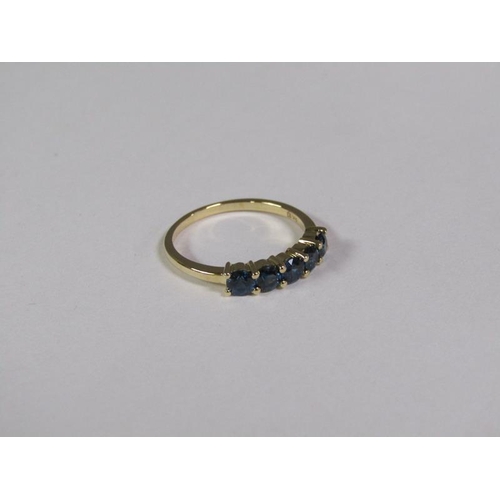 137 - A gold five stone sapphire ring.