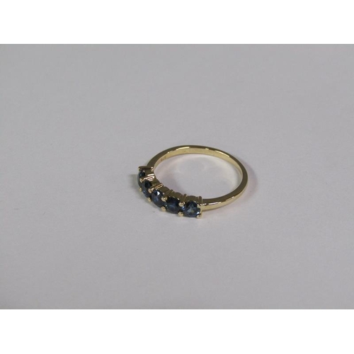 137 - A gold five stone sapphire ring.