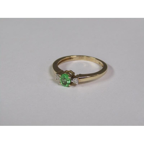 139 - A gold emerald and diamond ring, size O 1/2.