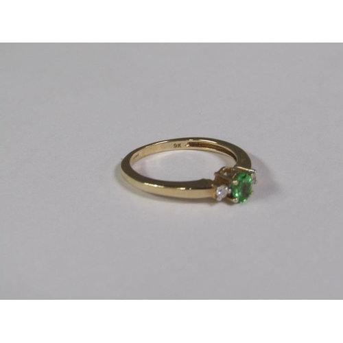 139 - A gold emerald and diamond ring, size O 1/2.