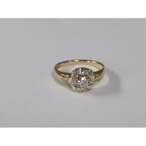 143 - An 18ct Art Deco diamond cluster ring, size O.