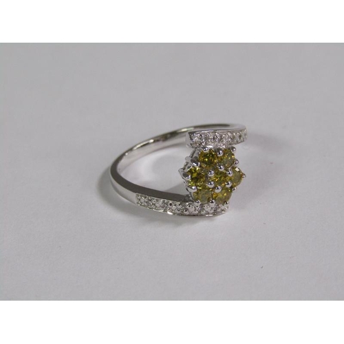 144 - An 18ct fancy yellow and white diamond set ring, size M 1/2.