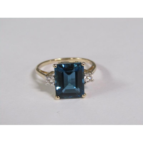 147 - A gold blue topaz and white topaz set ring, size N 1/2.