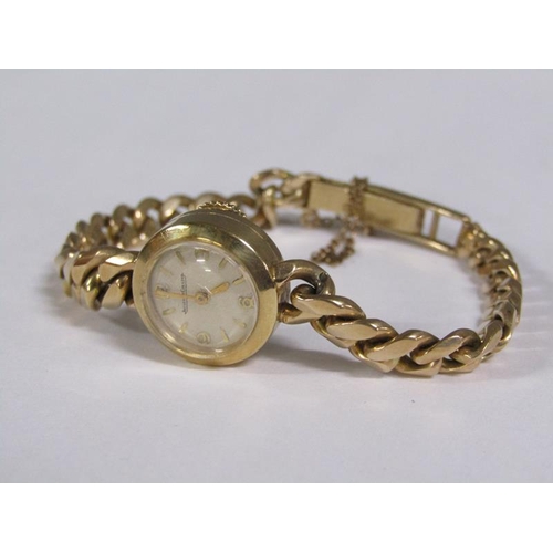 95 - A Jaegar Le Coultre 9ct gold ladies wristwatch and strap, the watch no.1696, 20.5g overall.