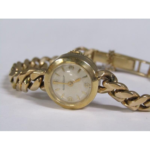 95 - A Jaegar Le Coultre 9ct gold ladies wristwatch and strap, the watch no.1696, 20.5g overall.