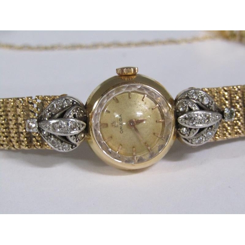 98 - An Omega ladies gold cocktail watch with diamond set hinge mounts, 29g overall.