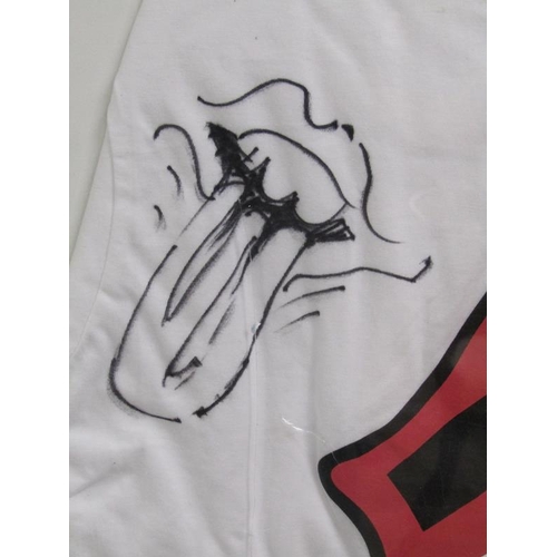 1 - A Rolling Stones t-shirt presented by Ronnie Wood and autographed by him, with additional sketches a... 