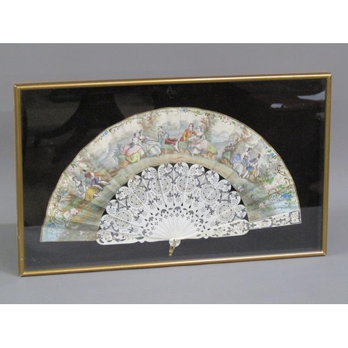 57 - An early 19c fan, the leaf hand painted with courting couples seated in landscapes amongst gilt high... 