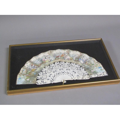 57 - An early 19c fan, the leaf hand painted with courting couples seated in landscapes amongst gilt high... 