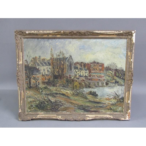 308 - George Hann - A coastal town with quayside and church, signed, oil on board, framed, 51cm x 67cm.