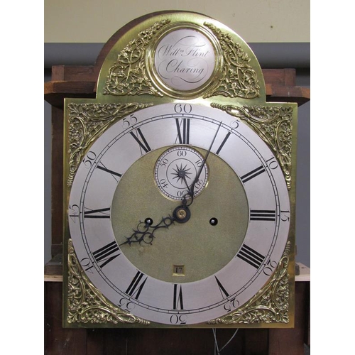 21 - A late 18c eight day longcase clock, the 30cm arch brass dial signed William Flint, Charing and havi... 