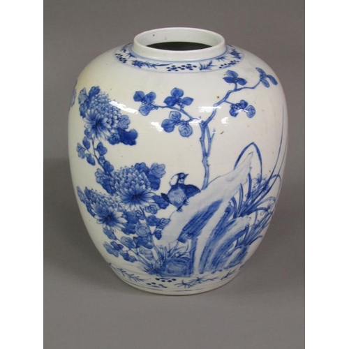 221 - A Chinese blue and white jar painted with birds perched on rocks amongst flowers and blossom, four c... 