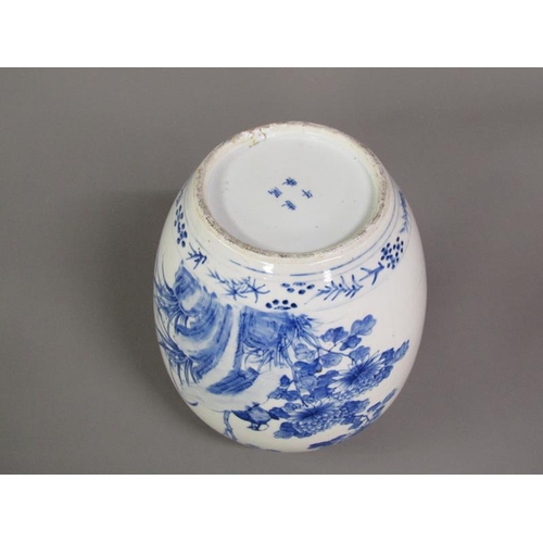 221 - A Chinese blue and white jar painted with birds perched on rocks amongst flowers and blossom, four c... 