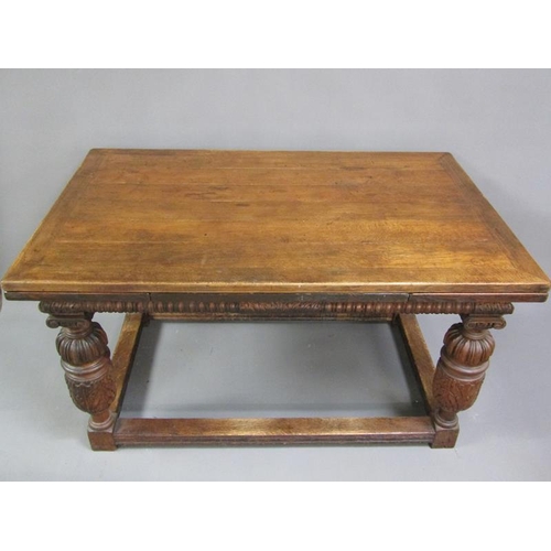 359 - A 19c oak Tudor style drawleaf extending dining table with a gadroon carved frieze rail and support ... 