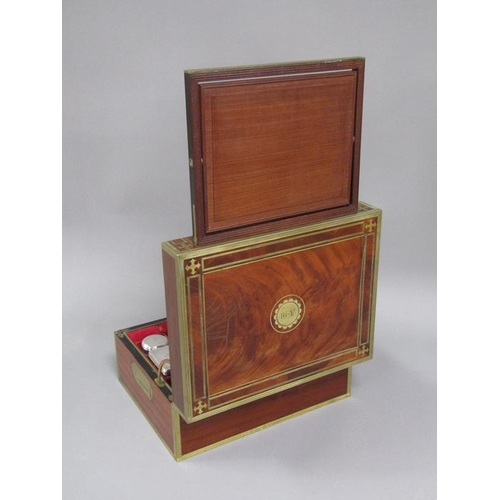 42 - A George III figure mahogany travelling box with brass edging, line inlay and motifs, fitted with th... 