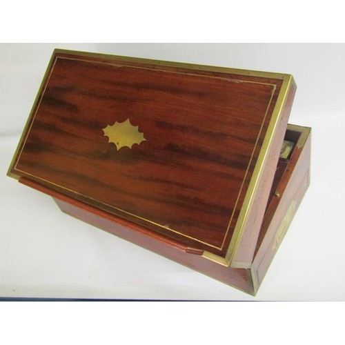 40 - An early 19c mahogany writing box, brass rail inlaid with brass edges and cut motif to the cover, gr... 