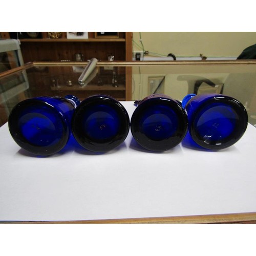 211 - A set of four Georgian Bristol blue condiment bottles and stoppers, each one named and being 'Kyan',... 