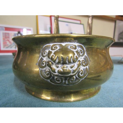 32 - An Oriental bronze censer of circular lobed form with two opposing lion masks, the base with a six c... 