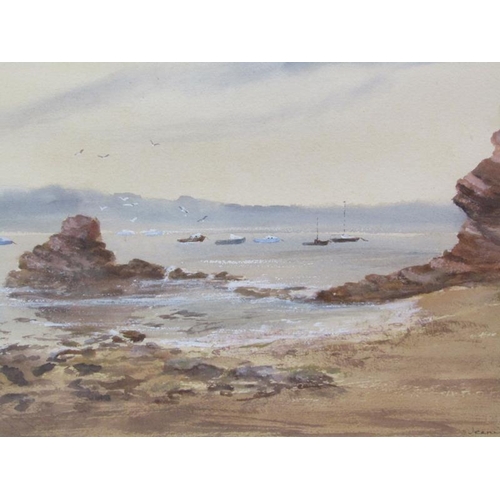 1034 - JEANIE BERRY - ROCKY COASTAL SETTING WITH MOORED BOATS, SIGNED WATERCOLOUR, F/G, 27CM X 36CM