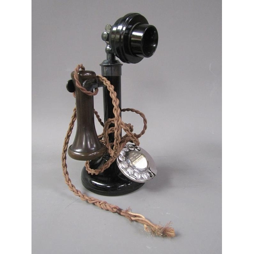 1113 - BLACK METAL AND PASTIC STICK TELEPHONE, 30CM H