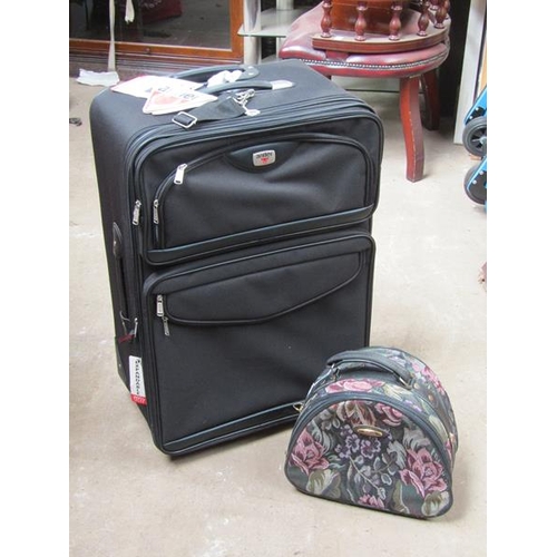 635 - BRAND NEW SUITCASE AND A CASE