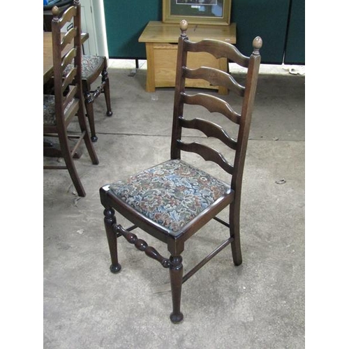 661 - SIX OAK LADDERBACK CHAIRS