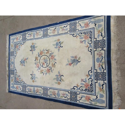 334 - BLUE AND CREAM RUG