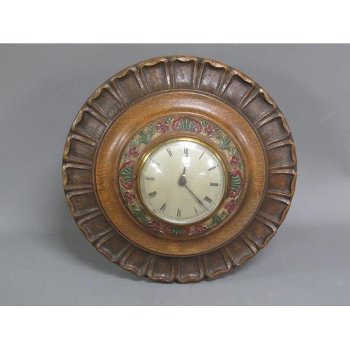 1067 - EARLY 20C WALL CLOCK OF CIRUCLAR FORM WITH CARVED OAK CASE, 42CM DIAM