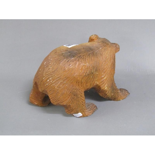 1086 - CARVED WOODEN BEAR, 25CM W