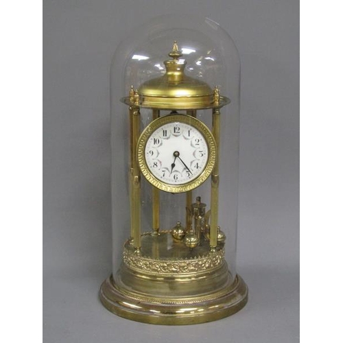 1211 - BRASS ANNIVERSARY TORSION CLOCK WITH PORCELAIN DIAL UNDER GLASS DOME, 45CM H