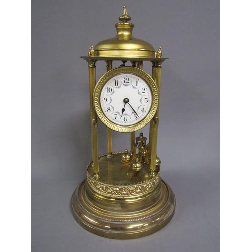 1211 - BRASS ANNIVERSARY TORSION CLOCK WITH PORCELAIN DIAL UNDER GLASS DOME, 45CM H