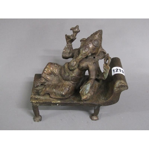 1219 - LARGE REPLICA BRONZED FIGURE OF GANESH IN RECUMBENT POSE, 20CM W