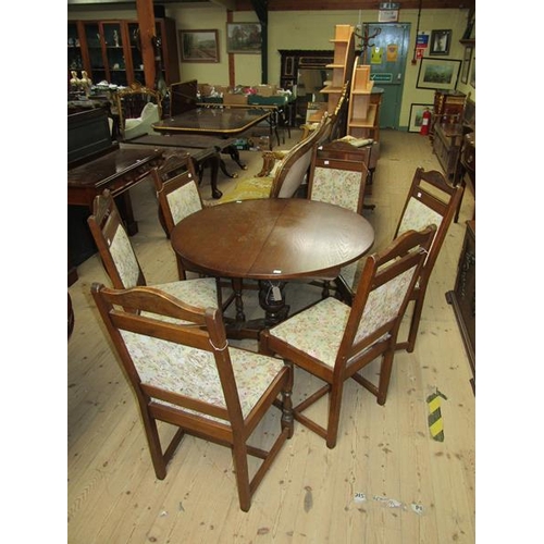 1579 - OAK CIRCULAR PEDESTAL DINING TABLE TOGETHER WITH SIX OAK FRAMED AND UPHOLSTERED DINING CHAIRS