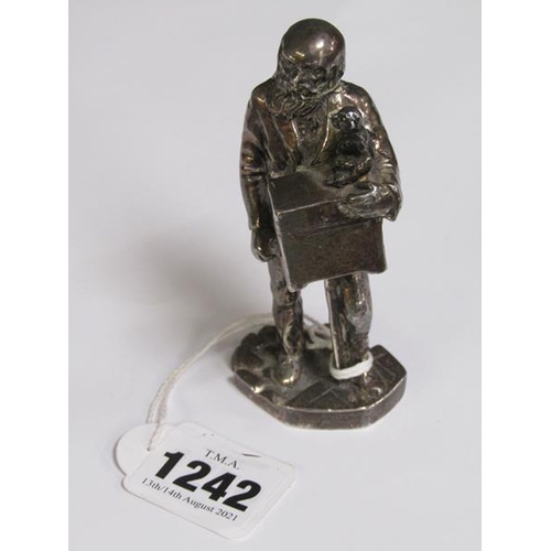 1242 - SILVER PLATED FIGURE OF A HURDYGURDY MAN, 10CM H