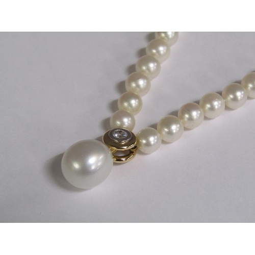 101 - A cultured pearl and diamond necklace with twenty four akoya cultured pearls, 18ct gold clasps set w... 