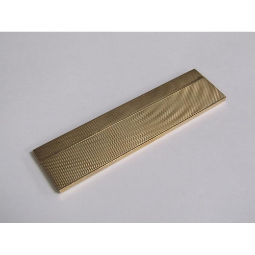 105 - A 9ct gold engine turned cased comb, makers marks S J R, Birmingham 1977, 36.6g total.