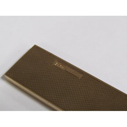 105 - A 9ct gold engine turned cased comb, makers marks S J R, Birmingham 1977, 36.6g total.