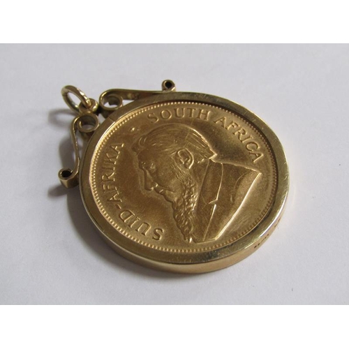 107 - A 1974 Krugerrand in a 9ct gold mount.