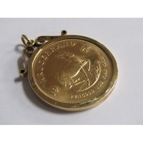 107 - A 1974 Krugerrand in a 9ct gold mount.
