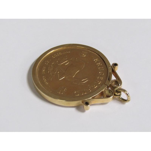 107 - A 1974 Krugerrand in a 9ct gold mount.