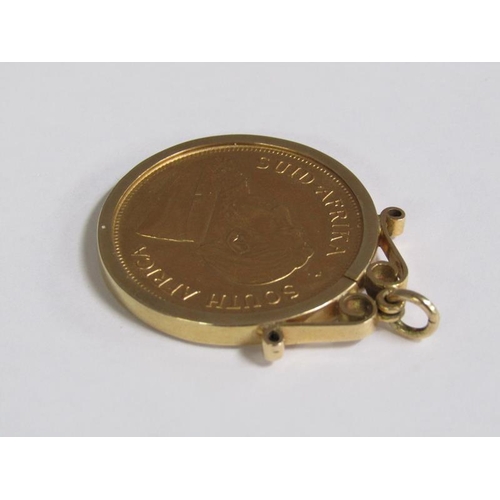 107 - A 1974 Krugerrand in a 9ct gold mount.