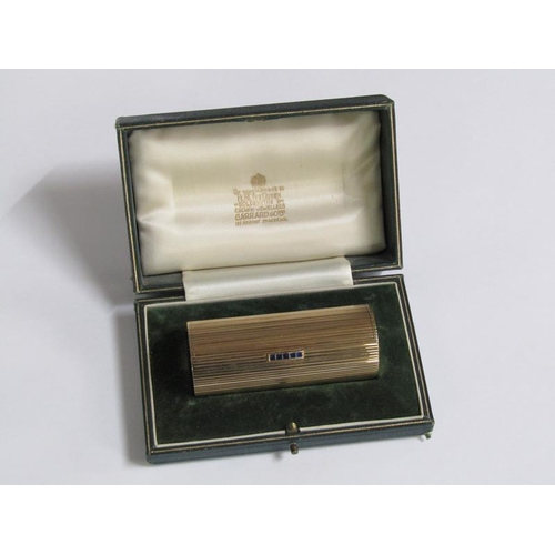 108 - A 1961 9ct gold and sapphire cylindrical box by Kurk Weiss for Garrard & Co, 62.8g, 7.5cm w.