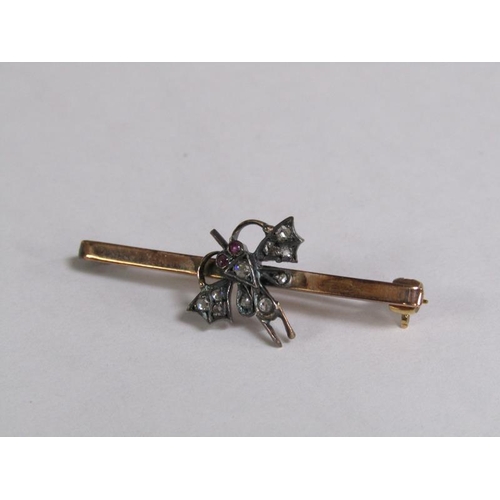 112 - A 9ct gold diamond set insect bar brooch, 2.6g.